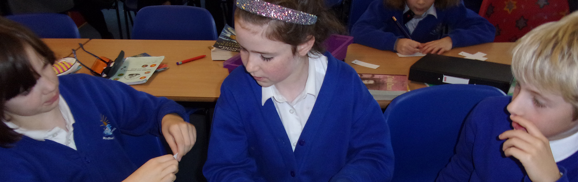 Three pupils learning