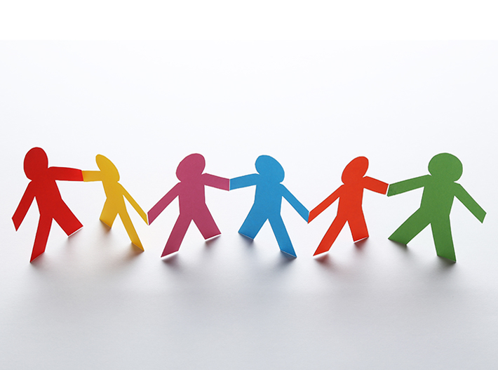 Paper chain of people holding hands