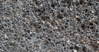 an close image displaying porous rock