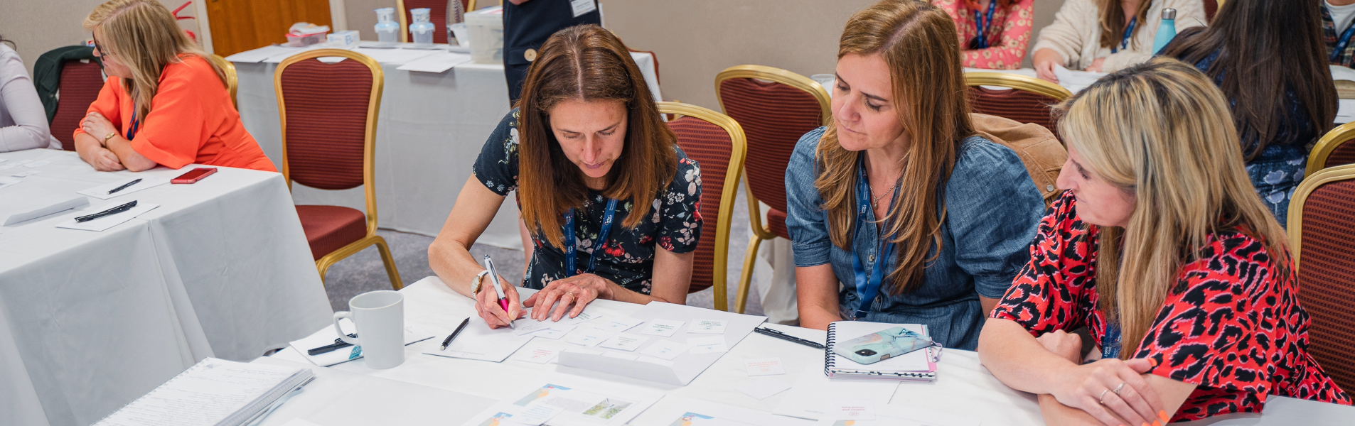 educators working on assignments given during a professional development course