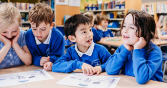 primary children engaged in classroom talk