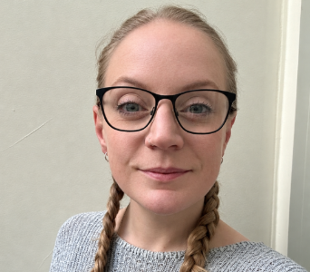 headshot of Olivia Ramsey, PSTT's Office Administrator